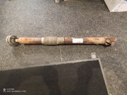 A used Jeep JK Wrangler drive shaft front axle 