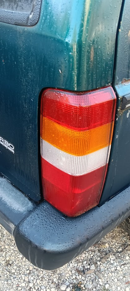 Tail light Right Jeep XJ Cherokee 4897400AC Preowned