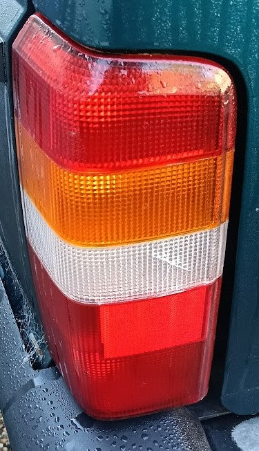 Tail light Right Jeep XJ Cherokee 4897400AC Preowned