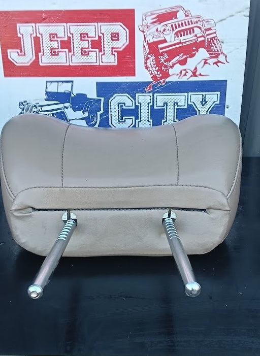 A beige leatherette Jeep seat headrest with two silver metal mounting bolts, displayed against a white background Jeep City graphic.