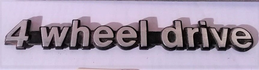 Badge Emblem Jeep AMC 4-wheel-drive 5451635