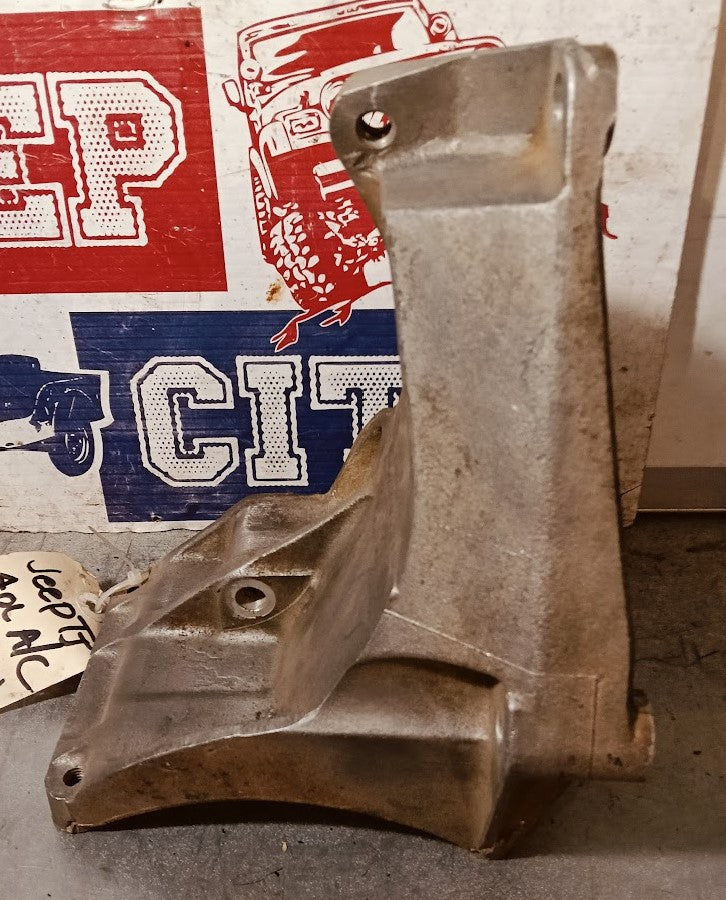 Bracket A/C Compressor Alternator Jeep TJ Wrangler 53013282AA