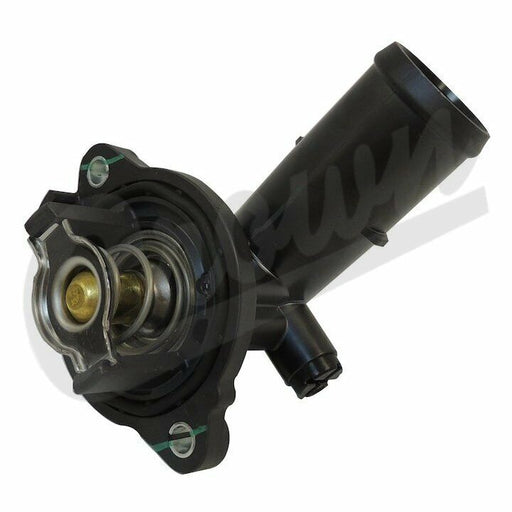 A black thermostat housing unit for a Jeep vehicle, showing the thermostat and seal.